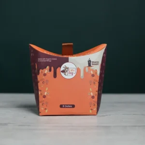 Datepop Snack Box with mix of orange, white and chocolate brown colour.